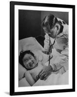 Doctor Examining Giggling Patient Recovering from Cold-Hansel Mieth-Framed Photographic Print