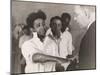 Doctor examining inmate's hand-Lucien Aigner-Mounted Photographic Print