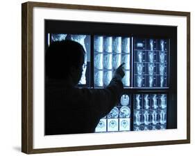 Doctor Pointing to X-Ray Images on Computer Screen-null-Framed Photographic Print