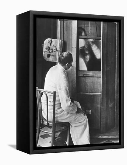 Doctor Using a Fluoroscope-null-Framed Stretched Canvas