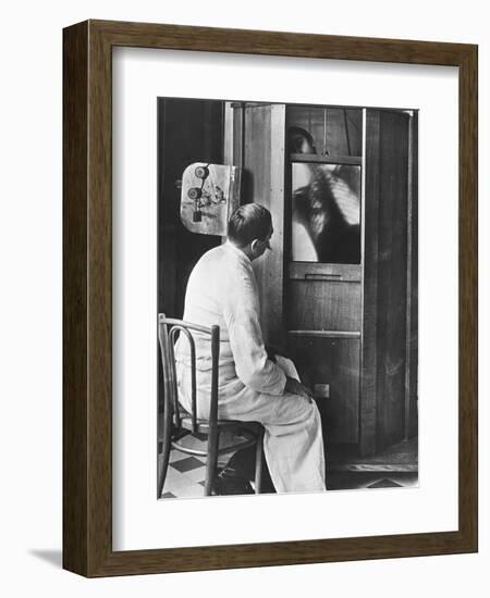 Doctor Using a Fluoroscope-null-Framed Photographic Print