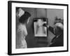 Doctors Examining X-Ray with Nurse-null-Framed Photographic Print