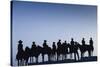 Dodge City Sign with Cowboy Silhouettes, Kansas, USA-Walter Bibikow-Stretched Canvas