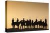 Dodge City Sign with Cowboy Silhouettes, Kansas, USA-Walter Bibikow-Stretched Canvas