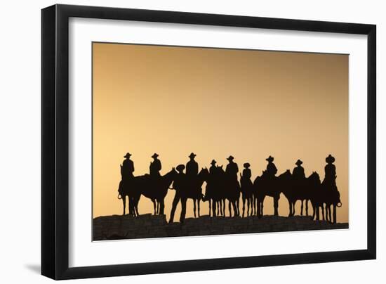 Dodge City Sign with Cowboy Silhouettes, Kansas, USA-Walter Bibikow-Framed Premium Photographic Print