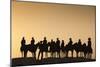 Dodge City Sign with Cowboy Silhouettes, Kansas, USA-Walter Bibikow-Mounted Premium Photographic Print