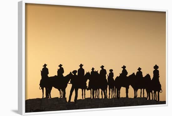 Dodge City Sign with Cowboy Silhouettes, Kansas, USA-Walter Bibikow-Framed Photographic Print