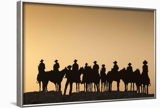 Dodge City Sign with Cowboy Silhouettes, Kansas, USA-Walter Bibikow-Framed Photographic Print