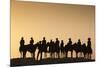 Dodge City Sign with Cowboy Silhouettes, Kansas, USA-Walter Bibikow-Mounted Photographic Print