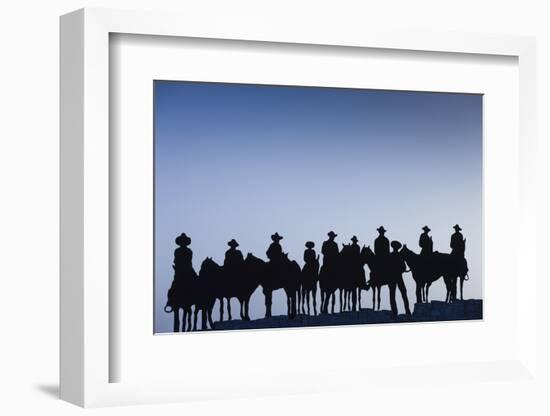 Dodge City Sign with Cowboy Silhouettes, Kansas, USA-Walter Bibikow-Framed Photographic Print