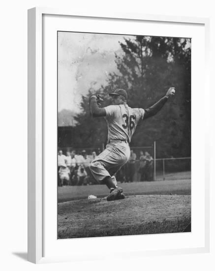 Dodger Don Newcombe Ready to Throw Ball During Game with Braves-null-Framed Premium Photographic Print