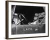 Dog at Fire Truck Wheel Smoking Pipe-null-Framed Photographic Print