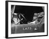 Dog at Fire Truck Wheel Smoking Pipe-null-Framed Photographic Print