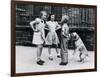 Dog Eating Ice Cream Cone Hidden behind Boy's Back-William Milnarik-Framed Photographic Print