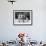 Dog Eating Ice Cream Cone Hidden behind Boy's Back-William Milnarik-Framed Photographic Print displayed on a wall