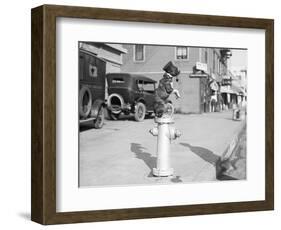 Dog Seated on Fire Hydrant-Bettmann-Framed Photographic Print