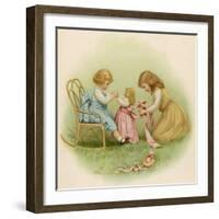 Doll is Dressed by Two Girls One in Front of Her While the Other Ties Her Sash Behind-Ida Waugh-Framed Photographic Print