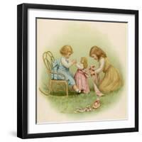 Doll is Dressed by Two Girls One in Front of Her While the Other Ties Her Sash Behind-Ida Waugh-Framed Photographic Print