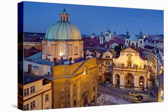 Dome of Church of St. Francis of Assisi with Church of the Holy Saviour in the Old Town of Prague-null-Stretched Canvas