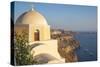 Domed church with steeple in town of Fira, Santorini, Greece.-Michele Niles-Stretched Canvas