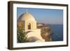 Domed church with steeple in town of Fira, Santorini, Greece.-Michele Niles-Framed Photographic Print