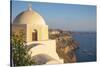 Domed church with steeple in town of Fira, Santorini, Greece.-Michele Niles-Stretched Canvas