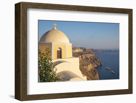 Domed church with steeple in town of Fira, Santorini, Greece.-Michele Niles-Framed Photographic Print