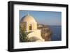 Domed church with steeple in town of Fira, Santorini, Greece.-Michele Niles-Framed Photographic Print