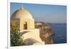 Domed church with steeple in town of Fira, Santorini, Greece.-Michele Niles-Framed Photographic Print