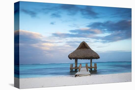 Dominican Republic, Punta Cana, Playa Blanca, Wooden Pier with Thatched Hut-Jane Sweeney-Stretched Canvas