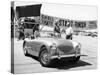 Donald Healey with an Austin Healey at a Motor Race-null-Stretched Canvas