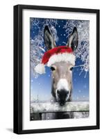 Donkey Looking over Fence Wearing Christmas Hat in Snow-null-Framed Photographic Print