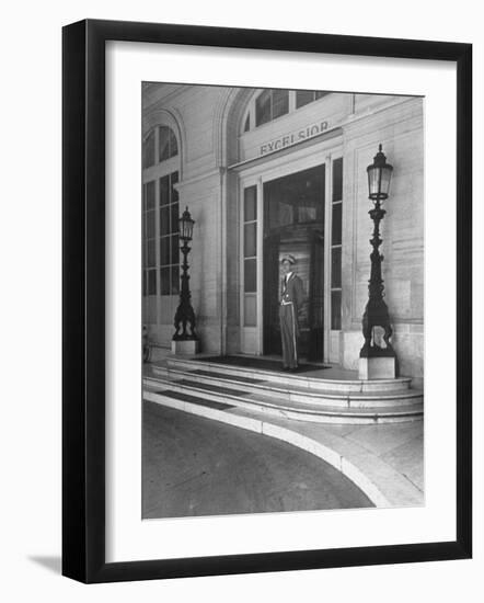 Doorman at the Entrance to Exelsior Hotel-Dmitri Kessel-Framed Photographic Print