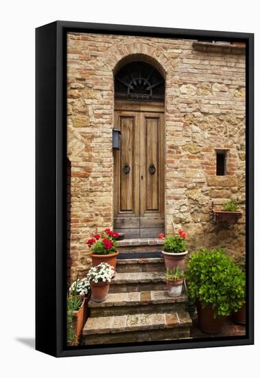 Doorway with Flowers, Pienza, Tuscany, Italy-Terry Eggers-Framed Stretched Canvas