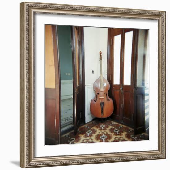 Double Bass Propped Against a Wall, Cienfuegos, Cuba, West Indies, Central America-Lee Frost-Framed Photographic Print