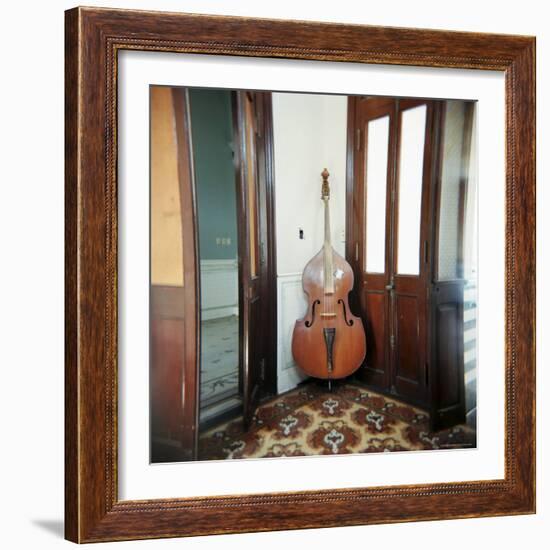 Double Bass Propped Against a Wall, Cienfuegos, Cuba, West Indies, Central America-Lee Frost-Framed Photographic Print