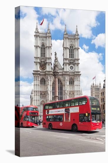 Double-Decker Buses Passing by a Cathedral, Westminster Abbey, City of Westminster, London, England-null-Stretched Canvas