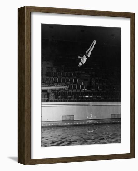 Double Twister Dive by Ohio State University Diver Miller Anderson, NCAA Swimmer of the Year-Gjon Mili-Framed Photographic Print