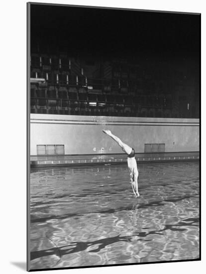 Double Twister Dive by Ohio State University Diver Miller Anderson, NCAA Swimmer of the Year-Gjon Mili-Mounted Photographic Print