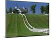 Double White Fence Flows from an Elegant Horse Barn, Woodford County, Kentucky, USA-Dennis Flaherty-Mounted Photographic Print