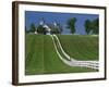 Double White Fence Flows from an Elegant Horse Barn, Woodford County, Kentucky, USA-Dennis Flaherty-Framed Photographic Print