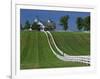 Double White Fence Flows from an Elegant Horse Barn, Woodford County, Kentucky, USA-Dennis Flaherty-Framed Photographic Print