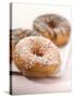 Doughnuts with Sugar Pearls and with Chocolate Icing-Alexander Feig-Stretched Canvas