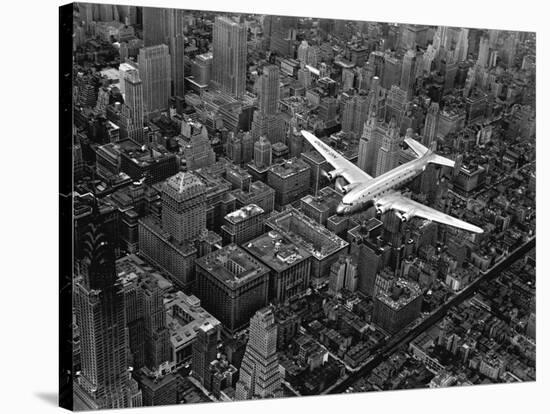 Douglas 4 Flying over Manhattan-Margaret Bourke-White-Stretched Canvas