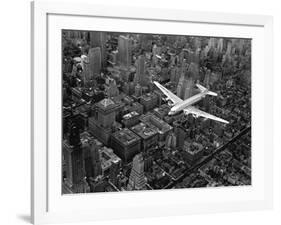 Douglas 4 Flying over Manhattan-Margaret Bourke-White-Framed Photographic Print