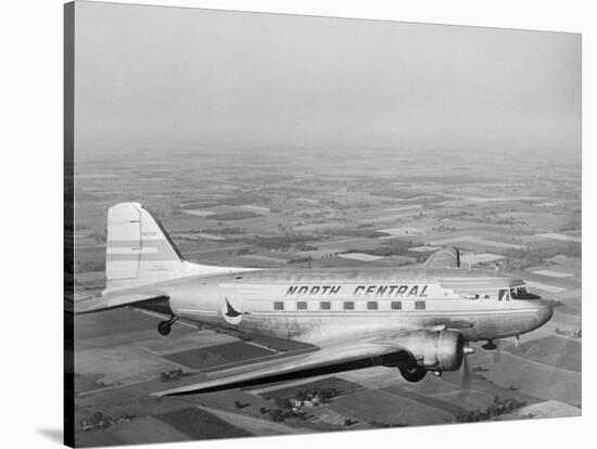 Douglas Dc-3 Plane in Flight-null-Stretched Canvas