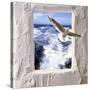 Dove Flying Toward Camera Through Plaster Frame with Ocean Waves in Background-null-Stretched Canvas