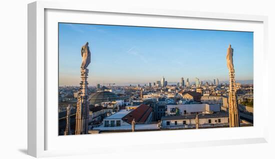 Downtown Milan as seen through the roof of the city's famous Duomo cathedral, Milan, Lombardy, Ital-Alexandre Rotenberg-Framed Photographic Print