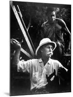 Dr. Albert Schweitzer, Medical Missionary and Humanitarian, with Carpenter at Site of His Hospital-W^ Eugene Smith-Mounted Premium Photographic Print