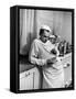 Dr. Ernest Ceriani in a State of Exhaustion, Having a Cup of Coffee in the Hospital Kitchen at 2 AM-W^ Eugene Smith-Framed Stretched Canvas